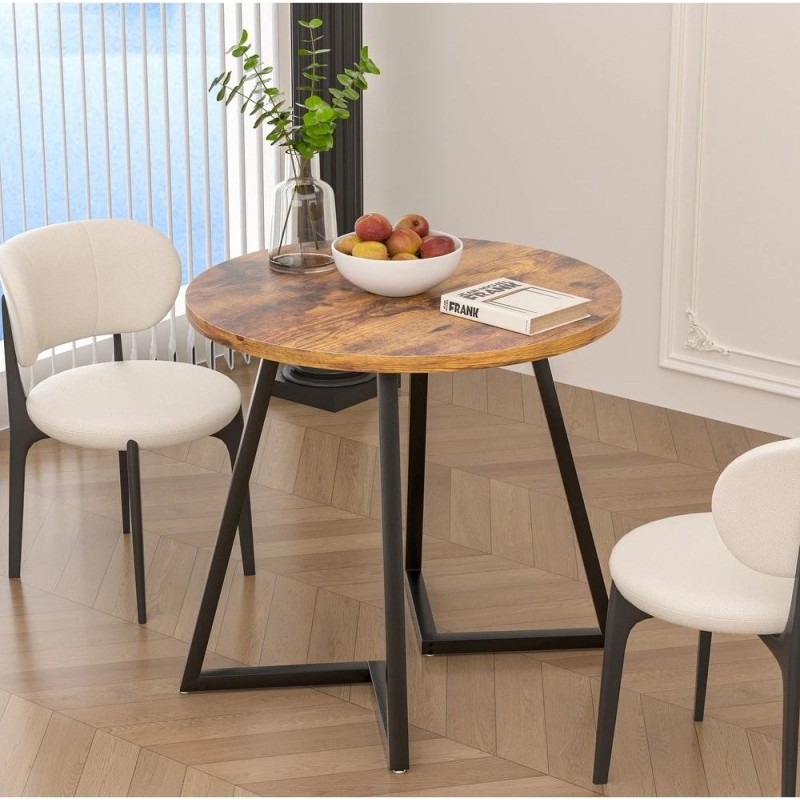 Невеликий круглий обідній стіл на 4 особи