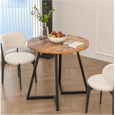 Невеликий круглий обідній стіл на 4 особи